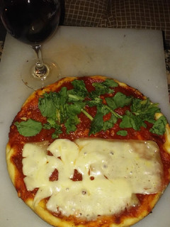 Una foto de Pizza de la casa