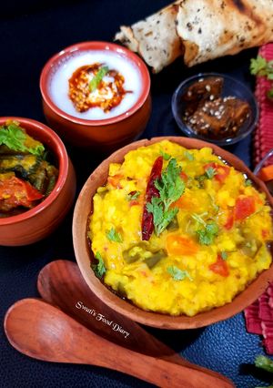 A picture of Dalia and Moong Dal Khichdi.