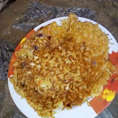 A picture of Egg coated leftover noodles.