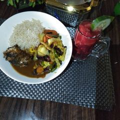 A picture of Grilled Crocker fish in Brown sauce wt Basmati Rice & Mixed Vegs.