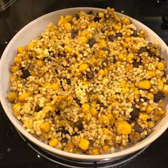 A picture of Curry millet grain with black beans and sweet corn.