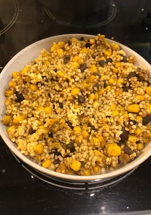 A picture of Curry millet grain with black beans and sweet corn.