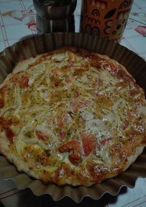 Una foto de Tarta de cebolla, tomate y queso
