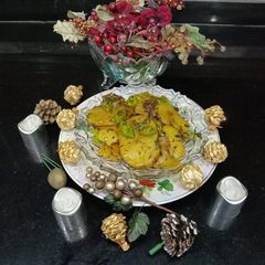 A picture of Masala potatoes slices.