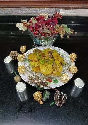 A picture of Masala potatoes slices.