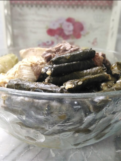 A picture of Stuffed Grape Leaves and Zucchini.