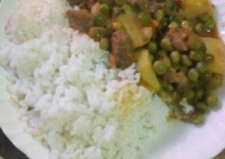 Step-by-Step Guide to Make Quick Coconut rice with peas stwe