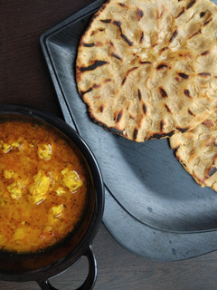 A picture of Khoba Roti with Gatta Curry.