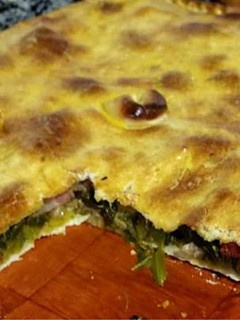 Una foto de Empanada de grelos