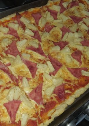 Una foto de Pizza con salsa de tomate casera