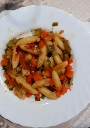 Una foto de "Ñoquis" con verduras