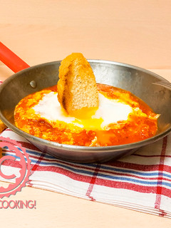 Una foto de Huevos en el Purgatorio