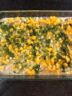 Una foto de Aguachile de tilapia con mango