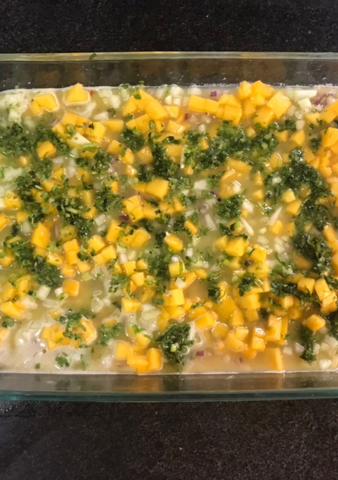 Una foto de Aguachile de tilapia con mango