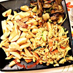 A picture of Chips,salad and liver source.