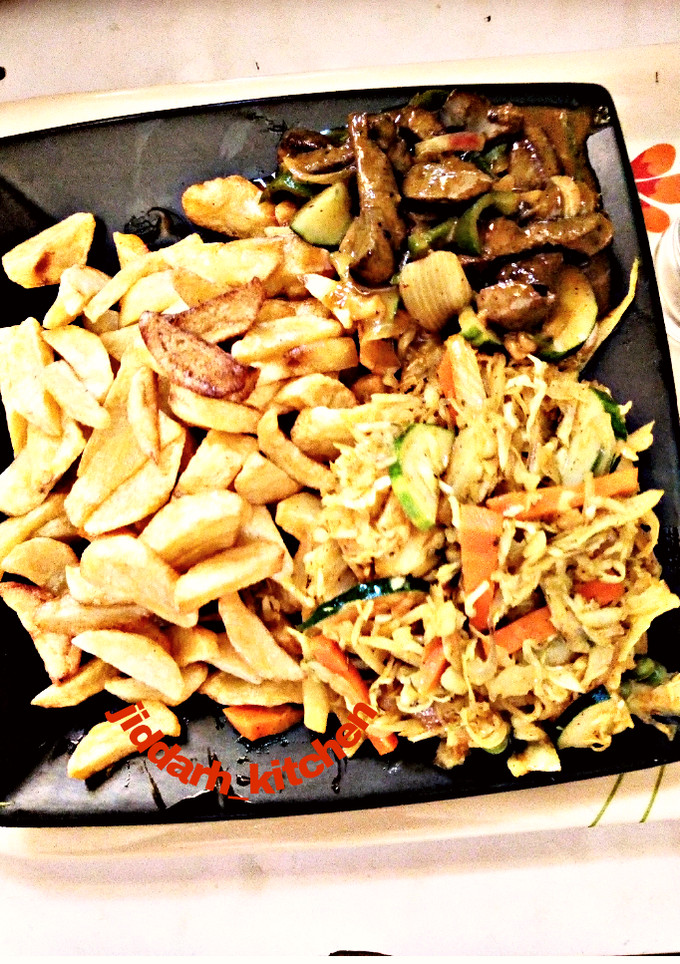 A picture of Chips,salad and liver source.
