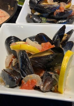 Une photo de Moules fumées sauce tomate et crème
