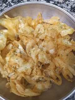 Una foto de Patatas crujientes con orégano