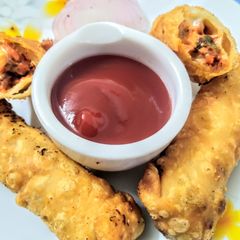 A picture of Tandoori chicken cigars.