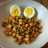 Garbanzos con guisantes y huevo