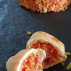 A picture of Carrot Halwa Stuffed Gujiya.