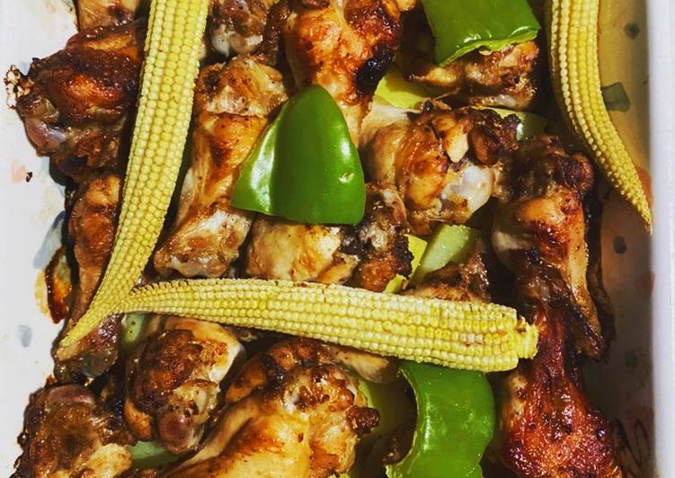 Roasted chicken wings with veggies