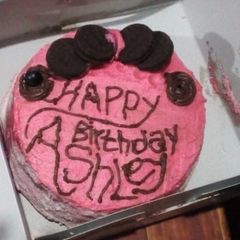 A picture of Chocolate Vanilla Layered Cake With Strawberry Flavored Frosting.