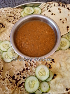 A picture of Roti serve with curry soup.