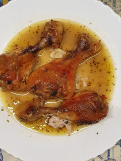 Una foto de Muslos de pollo al horno