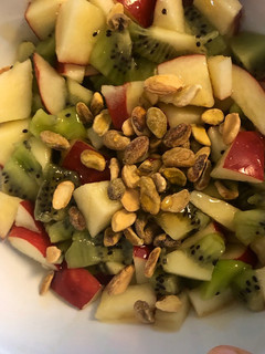 A picture of Apple and kiwi salad.