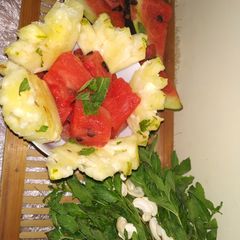 A picture of Pineapple and watermelon fruits salad.