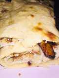 Fried egg and plantain wraped in pita bread