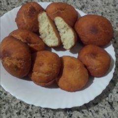 A picture of Mandazi flavored with lemon rind.