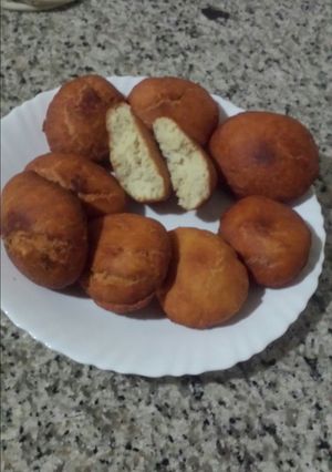 A picture of Mandazi flavored with lemon rind.