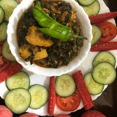A picture of Chicken with palak saag.