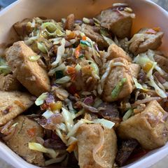 A picture of Stir fried awara with veggies and meats.