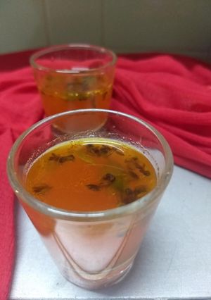 A picture of Orange rasam.