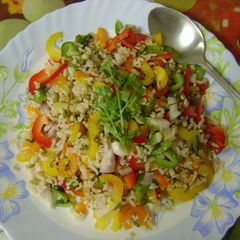 A picture of Brown Rice Salad with Bell Peppers & Sprouts.