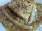 Una foto de bacalao al brasas