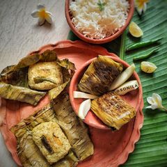 A picture of Raw mango fish paturi(Kancha aam diye macher paturi).