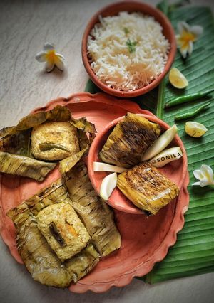 A picture of Raw mango fish paturi(Kancha aam diye macher paturi).