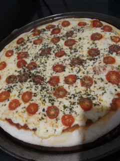 Una foto de Pizza con muzzarella