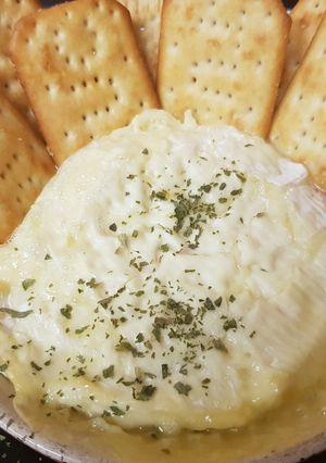 A picture of Camembert soft and smooth heated in the oven yum!!.