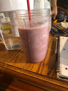A picture of Blackberry smoothie with fresh honey.