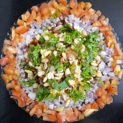 A picture of Cheese Dahi Bhalla Chaat.