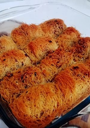 O poză a rețetei Cataif rulat cu nucă.