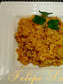 Una foto de Arroz con gambas