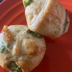 A picture of Spinach crescent roll puffs.