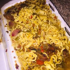 A picture of Indomie jollop with chicken.