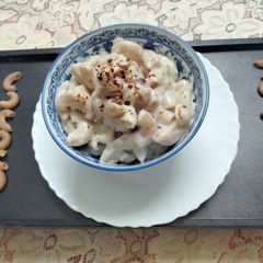 A picture of Ragi pasta in white sauce (garlic flavour).